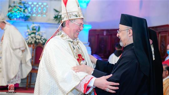 Com o patriarca copta católico Ibrahim Ishaq